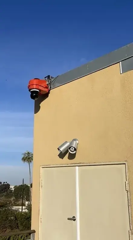Camera installed on an elevated rooftop site