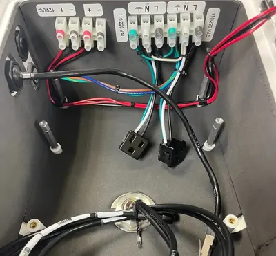 Wired power terminals inside a field enclosure